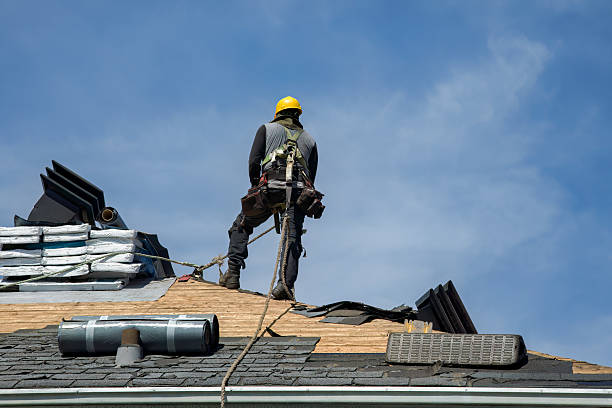Professional Roof Replacement technician working in Saint Marys, OH
